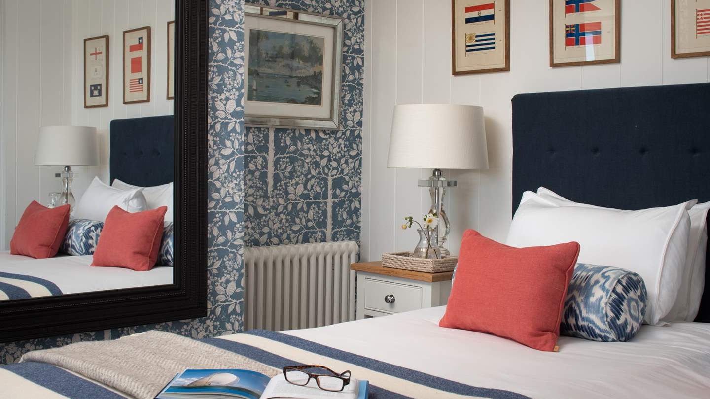 You’ll find a super king-sized bed which can be made into twin beds