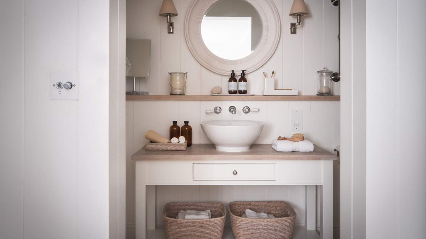 The en suite in handsome neutral tones 