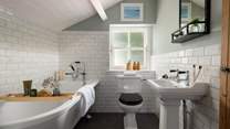 The characterful bathroom, complete with a clawfoot bathtub 