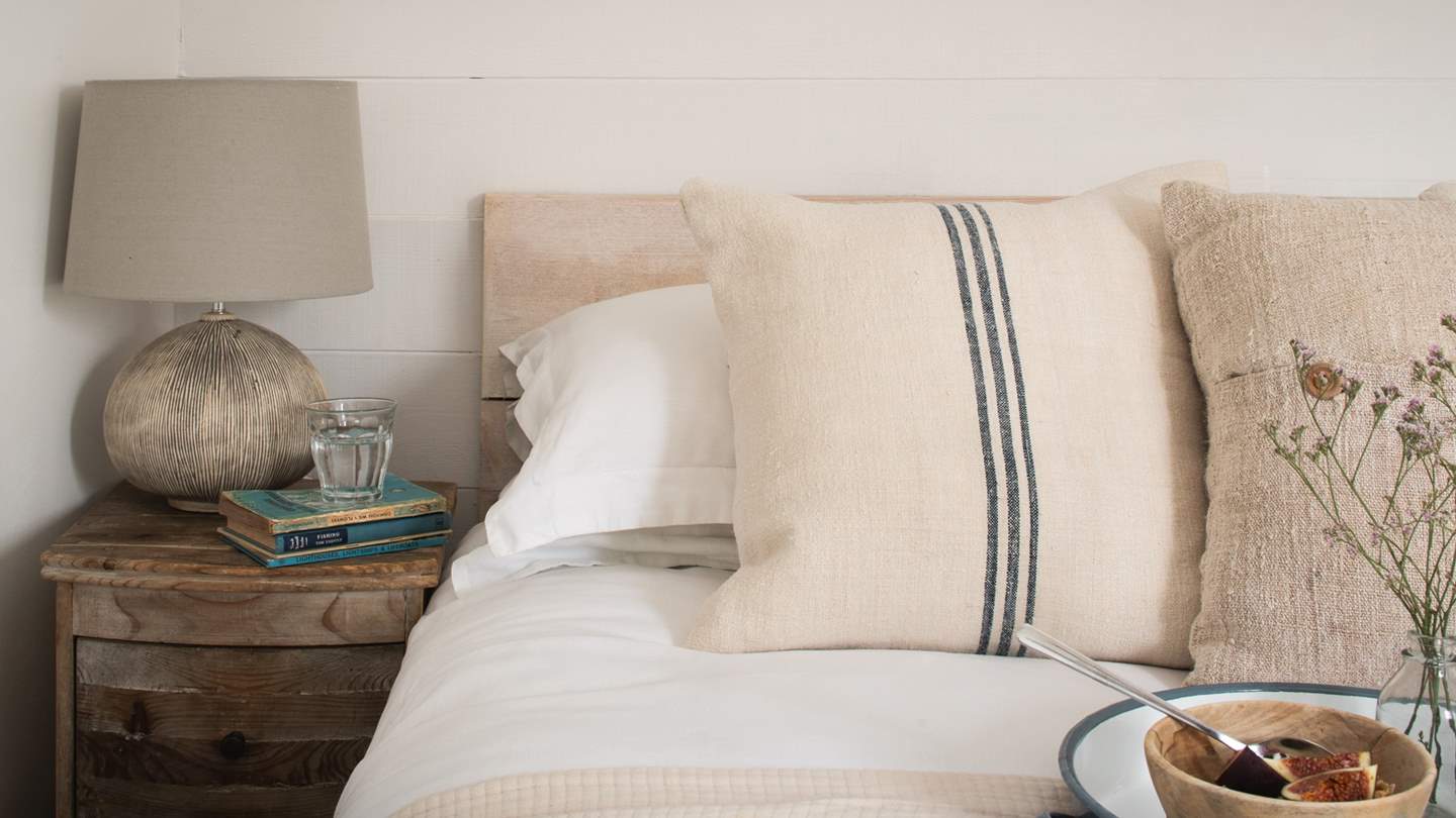 Adorned with gloriously plump pillows, and savour a comforting cup of tea in the sumptuous king-sized bed... 