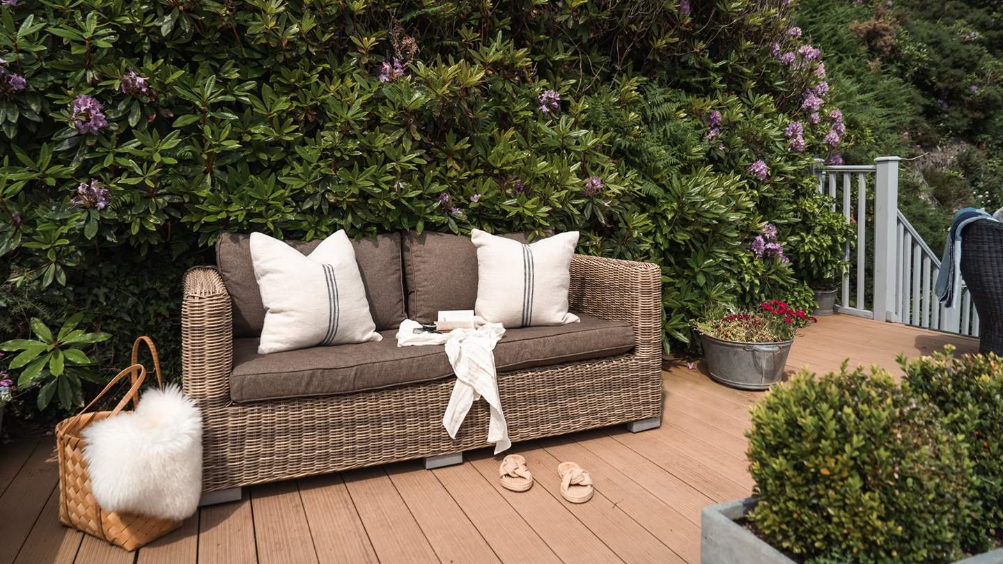 You'll find a cosy outdoor sofa for peaceful moments with your chosen read... 