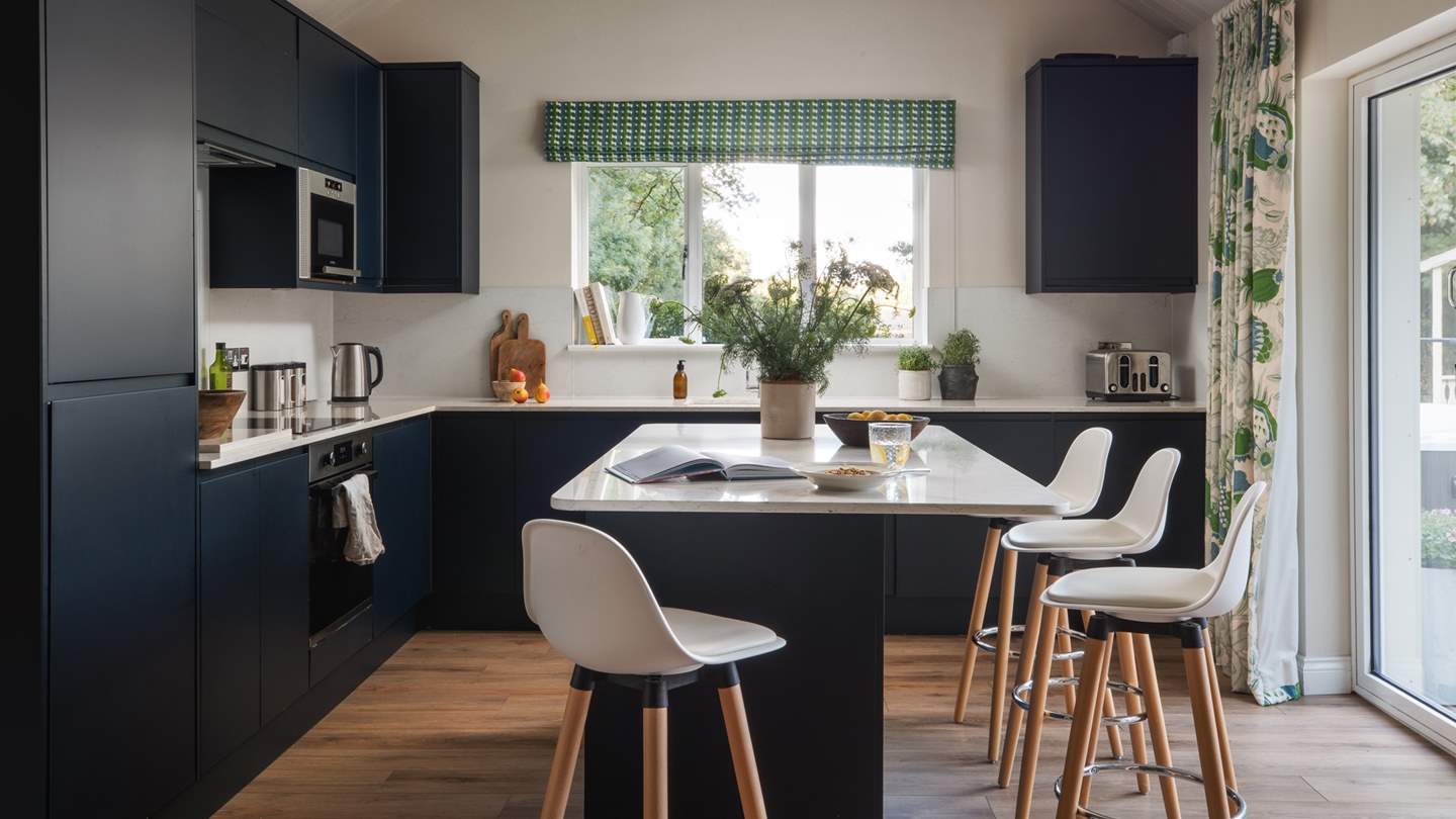 Settle around the marbled island and admire the chef at work... 