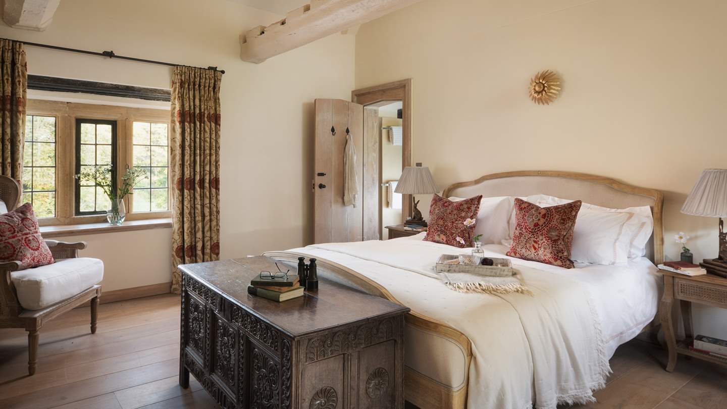 Uncover the beauty of the master bedroom, where a stunning super king-sized bed awaits for the most blissful of slumbers