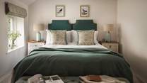 Swathed in luxurious linens, cloud-soft bedding and opulent cushions and throws