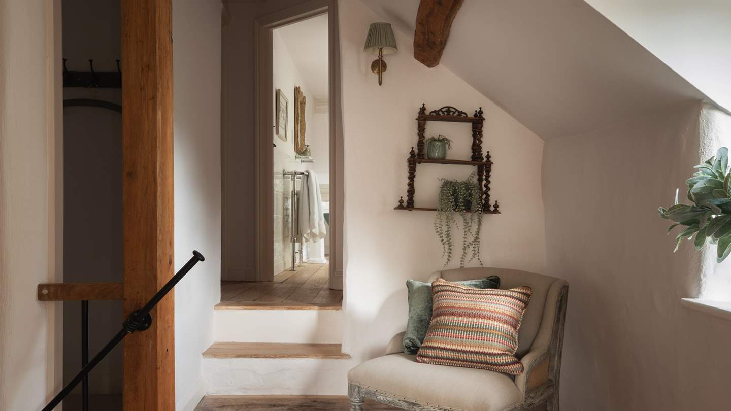 Settle down with your current page-turner in this cosy nook on the landing