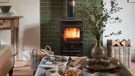 Savour tea and cake beside the wood burning stove during the colder months