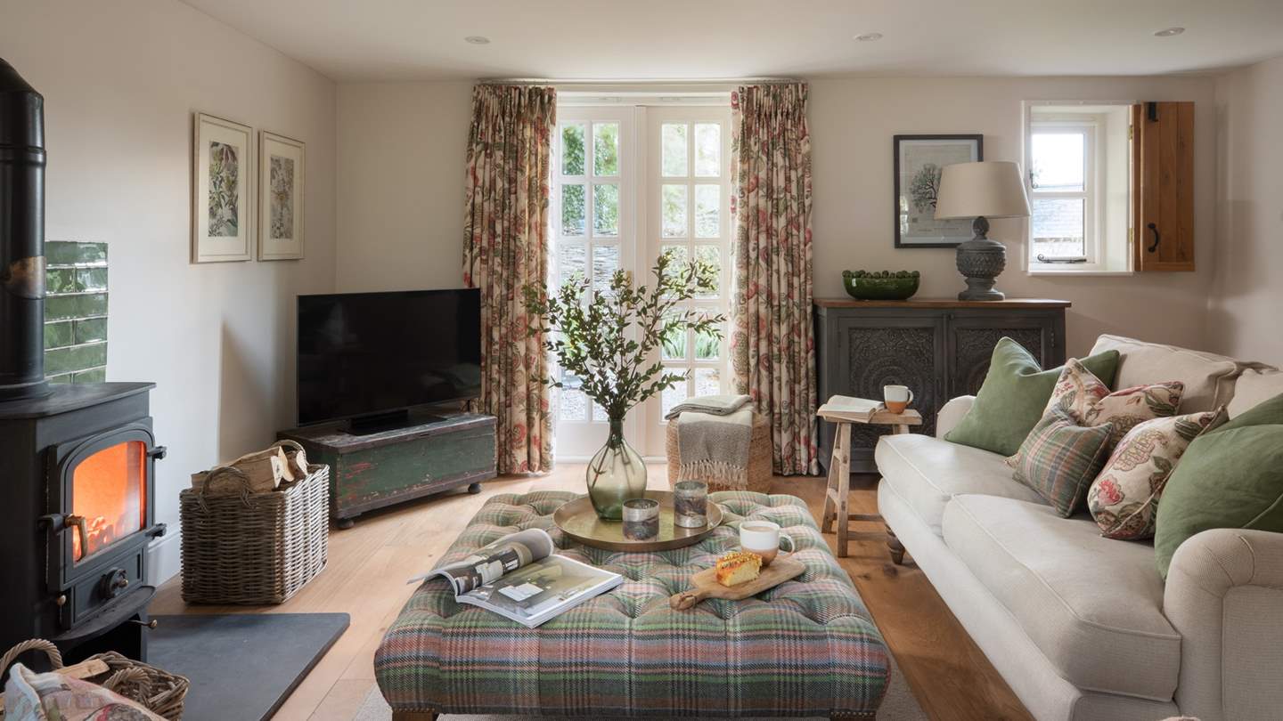 You'll find plenty of space in this cosy nook for everybody to stretch out in style... 