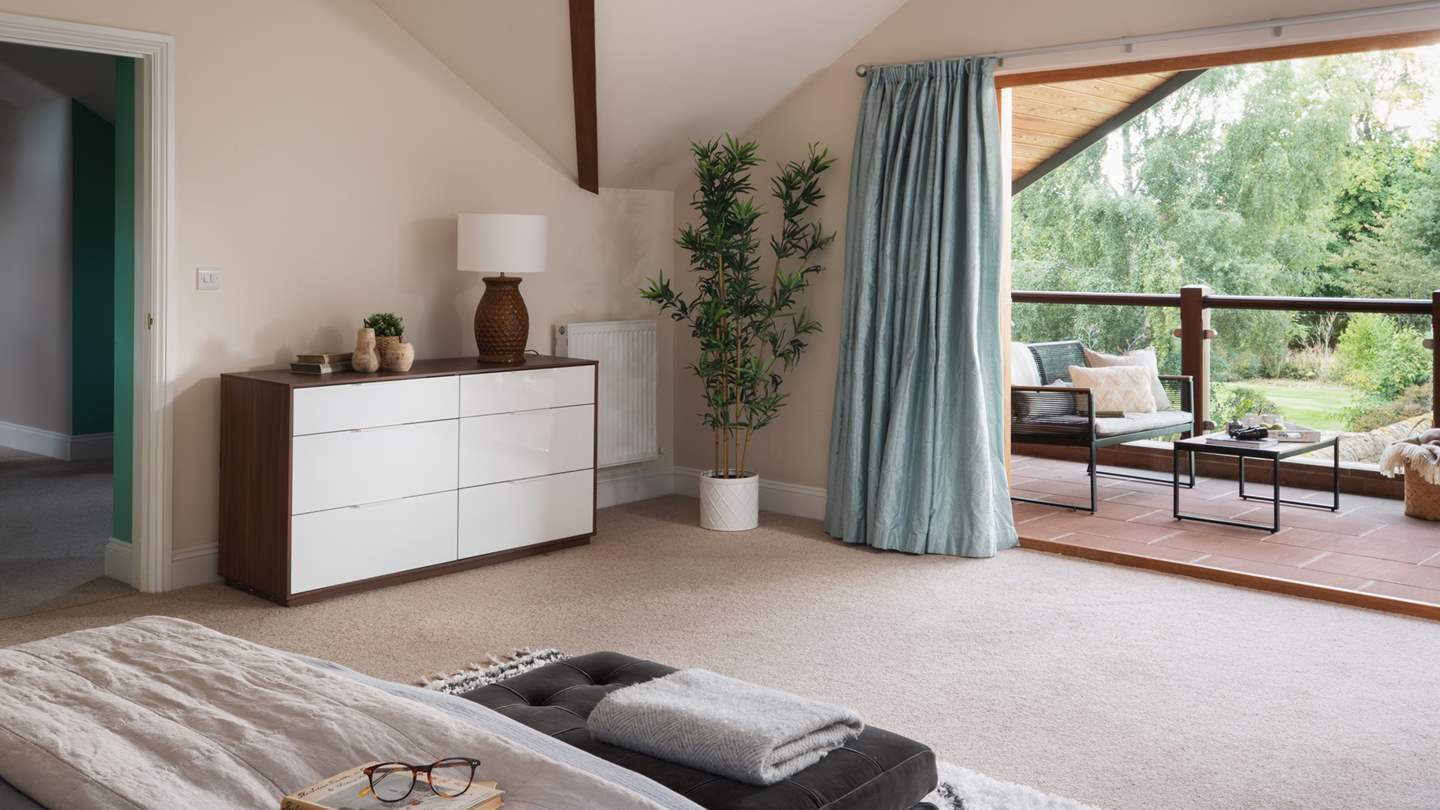 The balcony also offers its own little nook in which to enjoy the tranquil surrounds