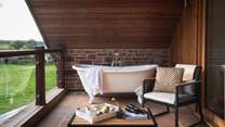 Only the most decadent soaks await in the dreamy outdoor bathtub...