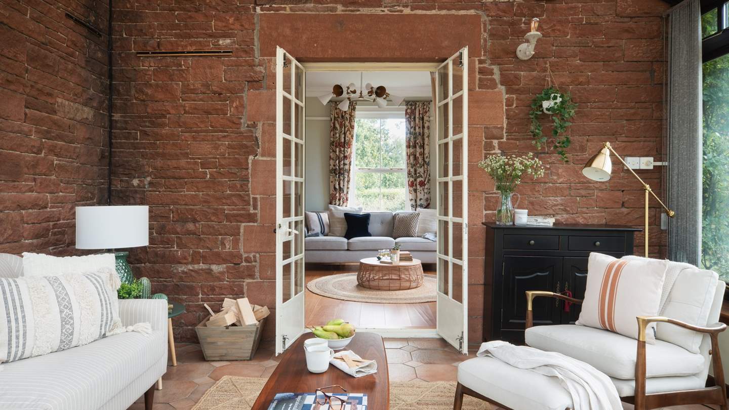 Cosy up on the sumptuous sofa for the last of the afternoon light, made even more special with a glass of something soul-warming in hand