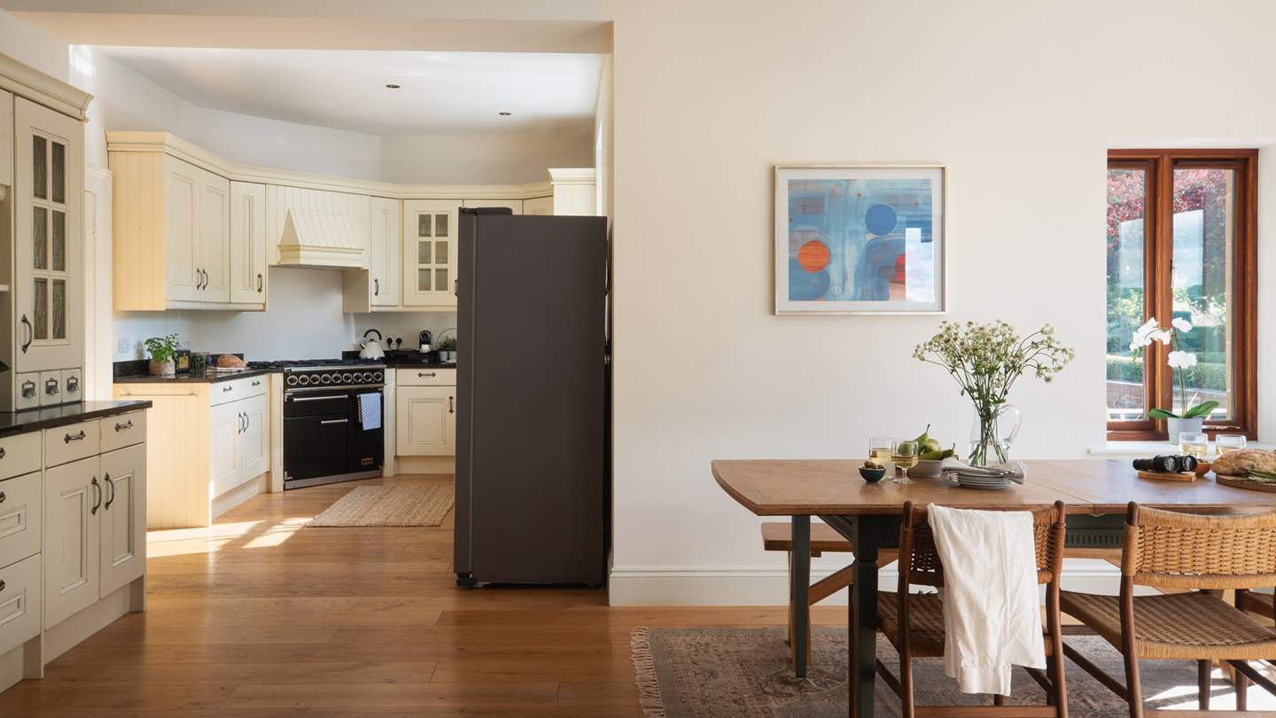 Equipped with everything you could possibly need to build lasting memories around the table, the country-chic, open-plan kitchen and dining area is perfect for gathering together