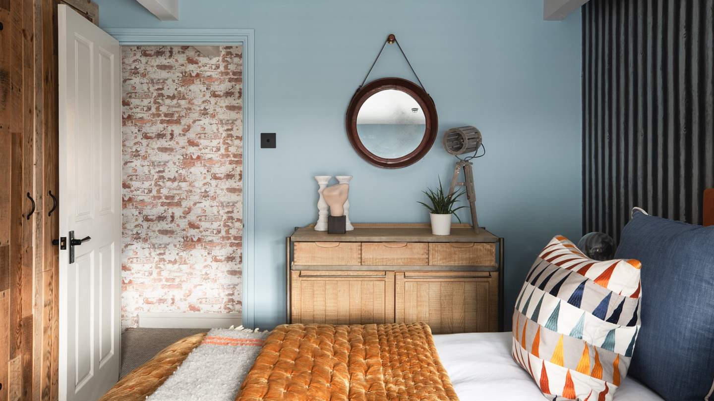 There's ample storage space, with a dressing table and a bespoke wardrobe 