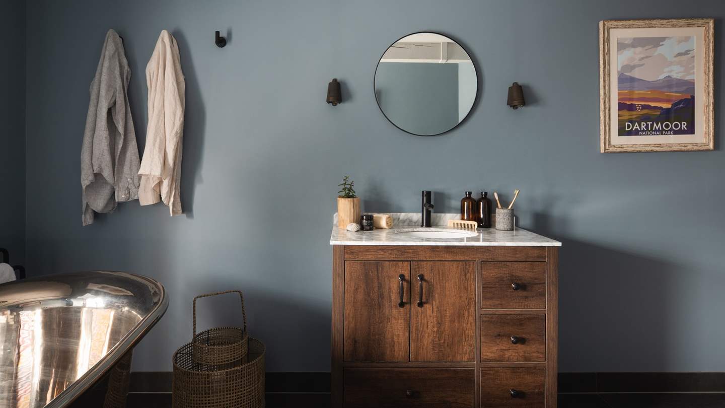 The ensuite bathroom is a dream in soft shades of blue 