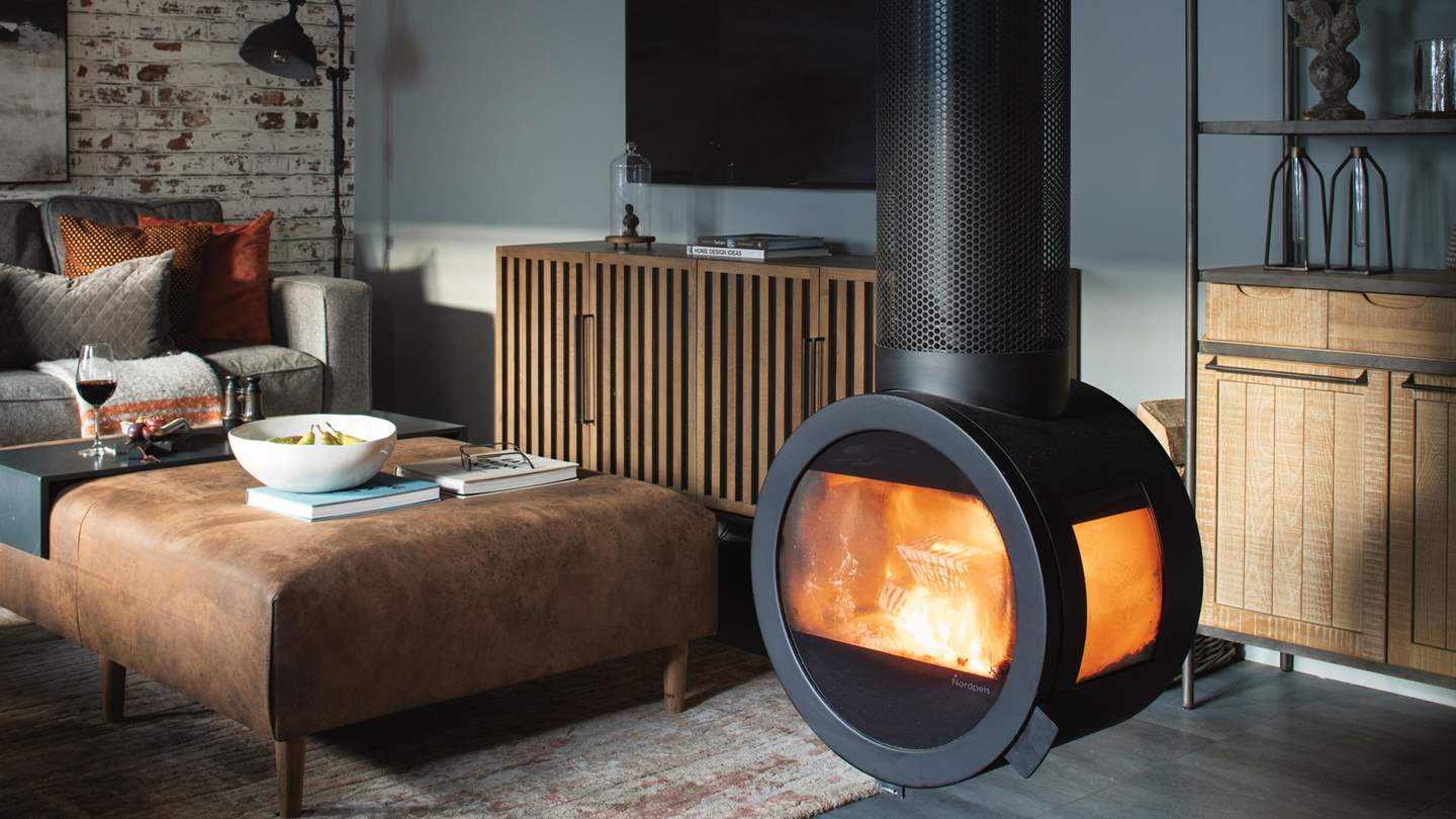 We just love the modern ceiling hung log burner