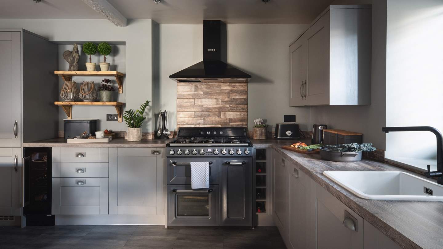 The sleek kitchen is a dream to cook in 