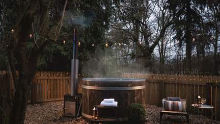Perfectly secluded and tucked amongst the trees, you will find the wood-fired hot tub