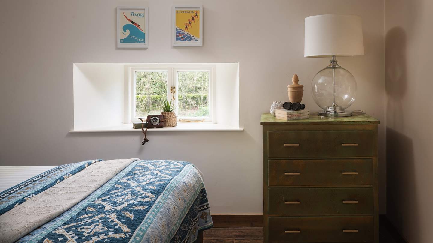 We just love the antique olive-toned chest of drawers in the master bedroom 