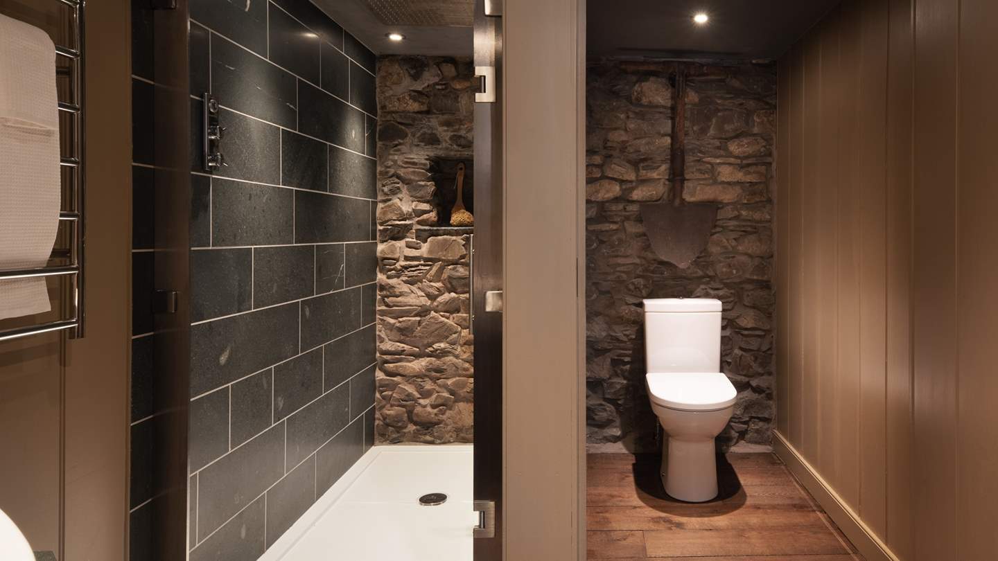 Additionally, a soothing wooden-clad spa-esque en suite awaits