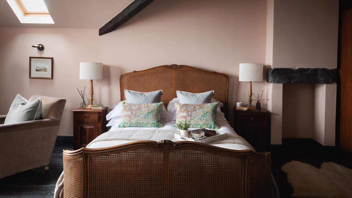 With a romantic feature fireplace and dark wood flooring, this boudoir is simply heavenly... 