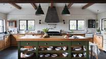 The rustic kitchen island is perfect for budding chefs