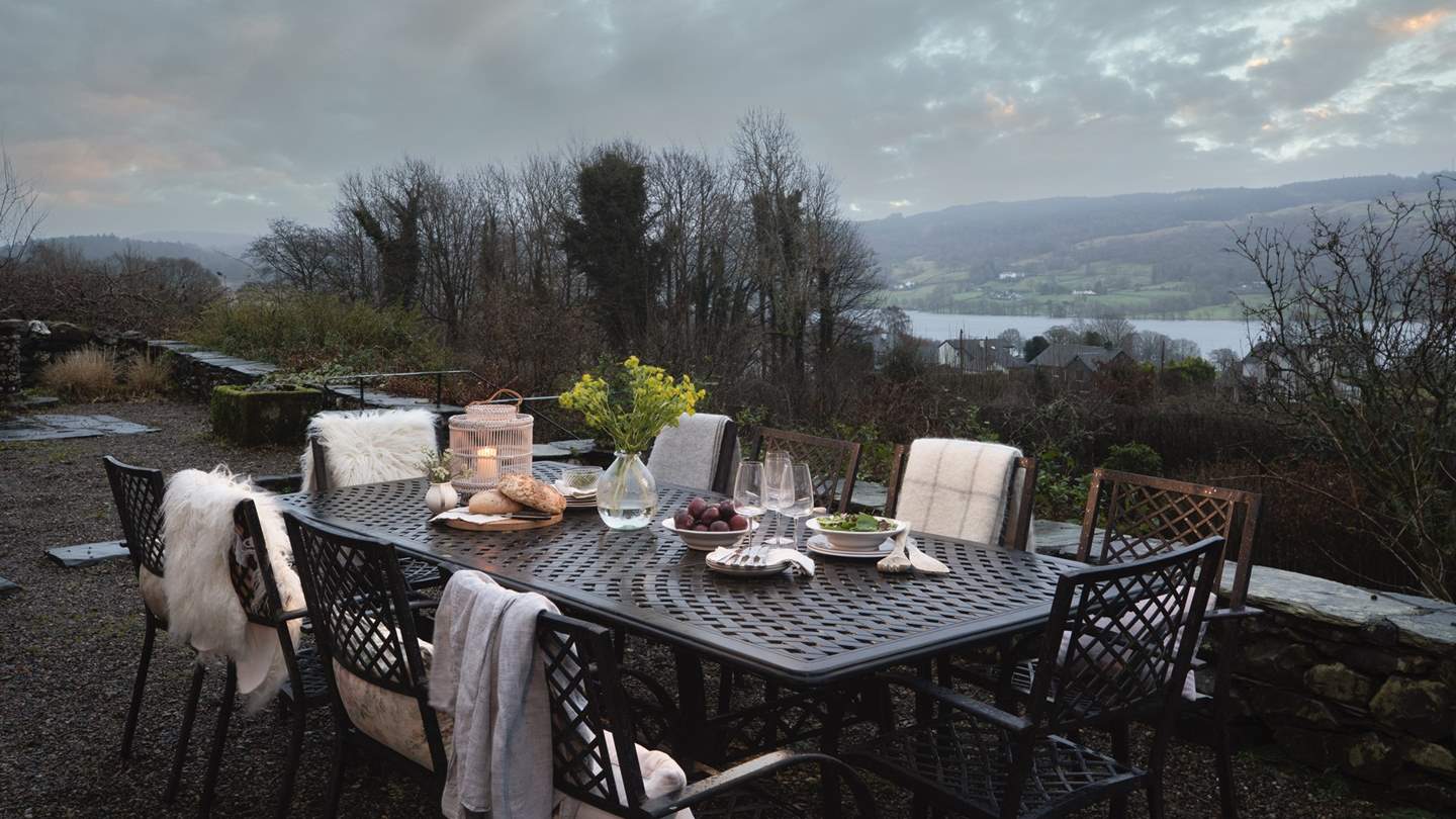 On the spacious terrace sits a large outdoor dining table for indulgent alfresco dining on sun-soaked days
