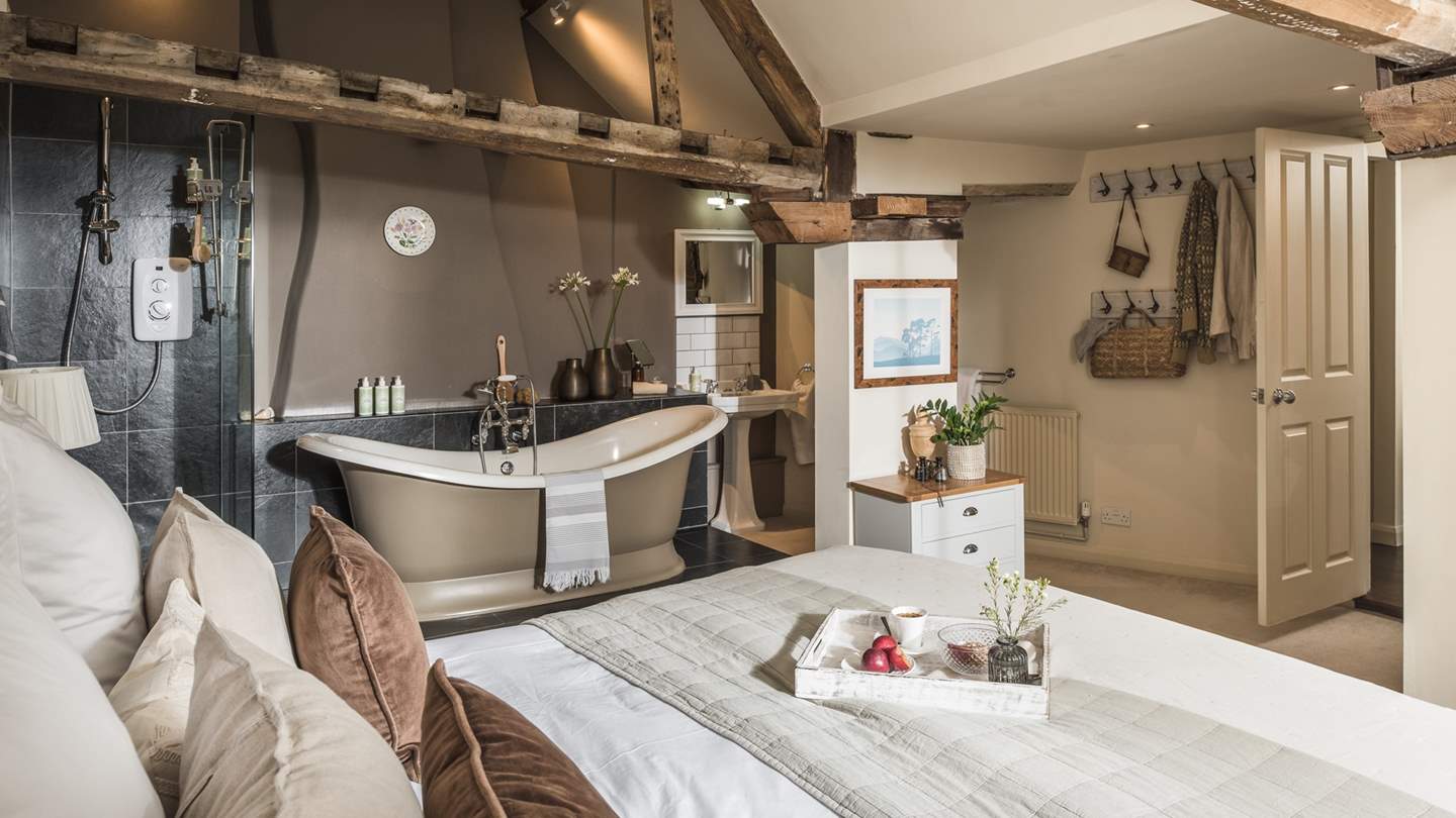 Fall in love with The Georgian House. The master bedroom is simply a dream, with an open plan ensuite bathroom with a spacious shower and luxury slipper bath