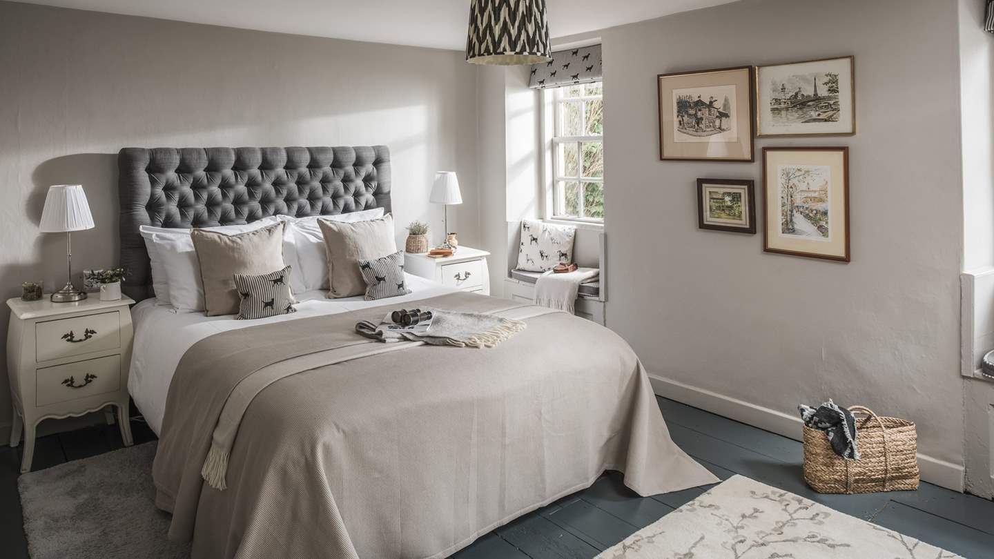 Overlooking Market Square is the beautiful second bedroom, brushed with light tones perfectly balanced throughout