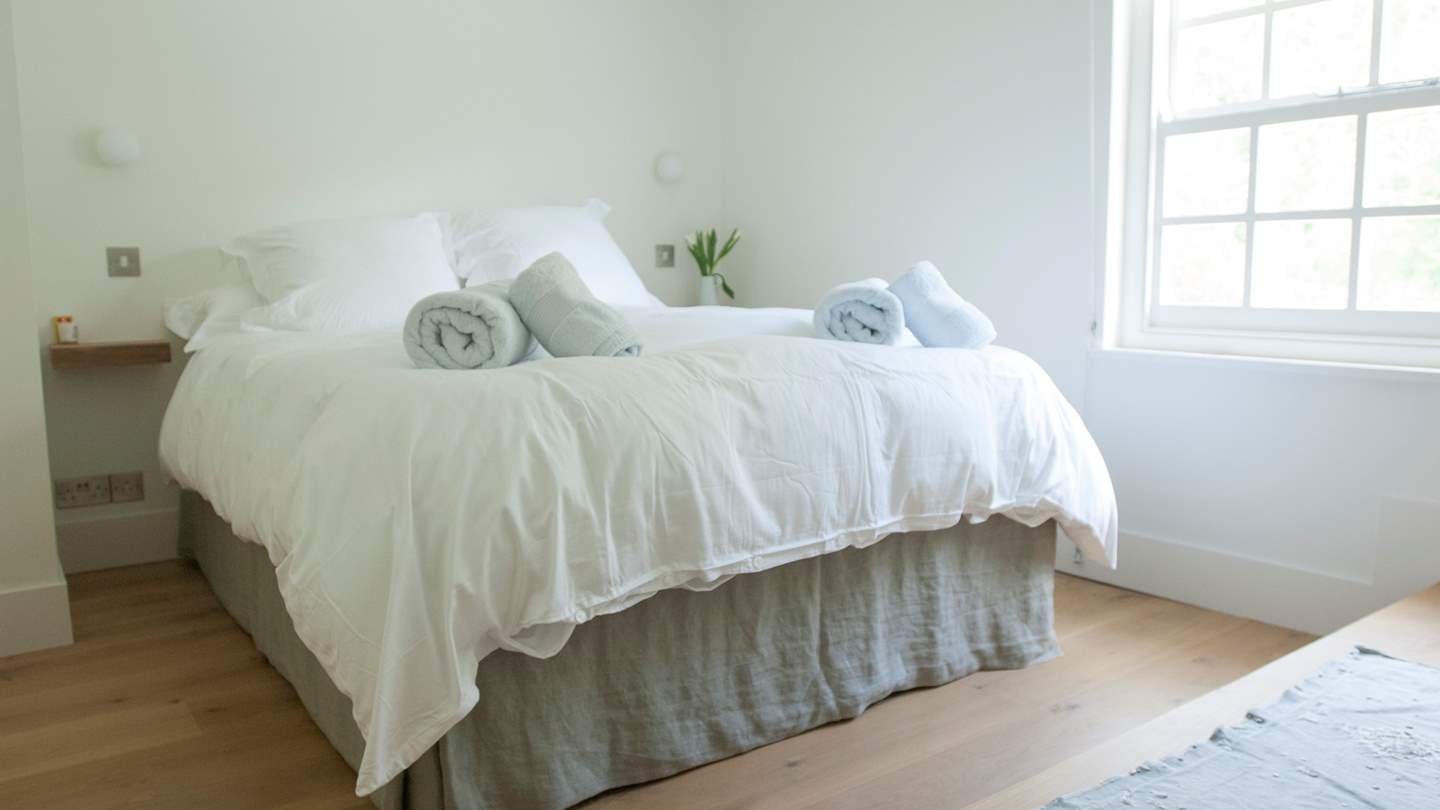 The third bedroom is cosy and has an en suite shower room