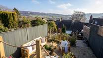 A wonderfully landscaped garden promises spectacular views across nearby patchwork fields 
