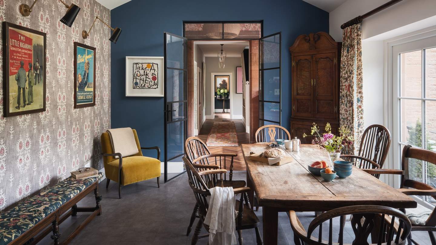 Designed in a long, open-plan layout, it features both a kitchen and an informal dining area 