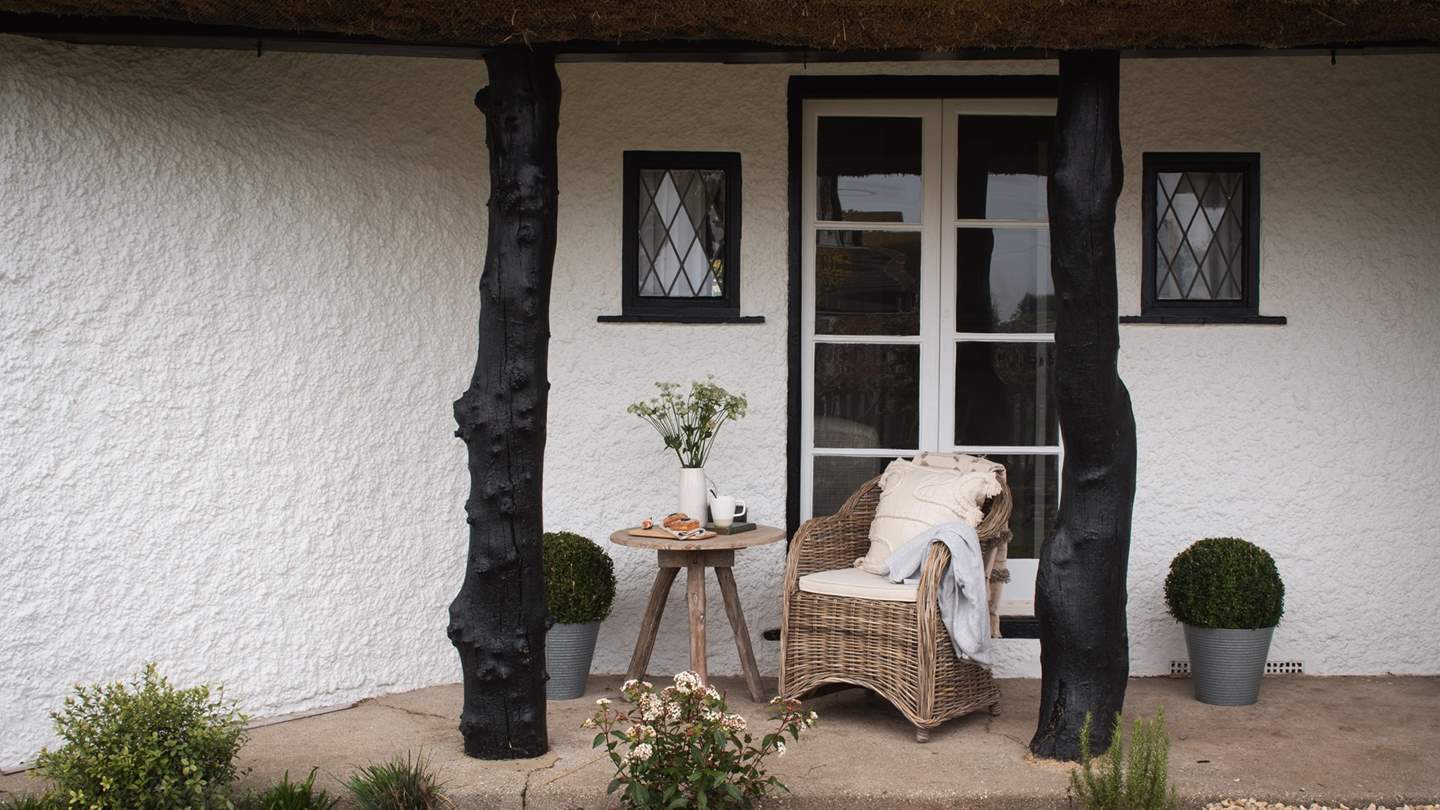 Cosy wicker chairs beckon the sun-seekers