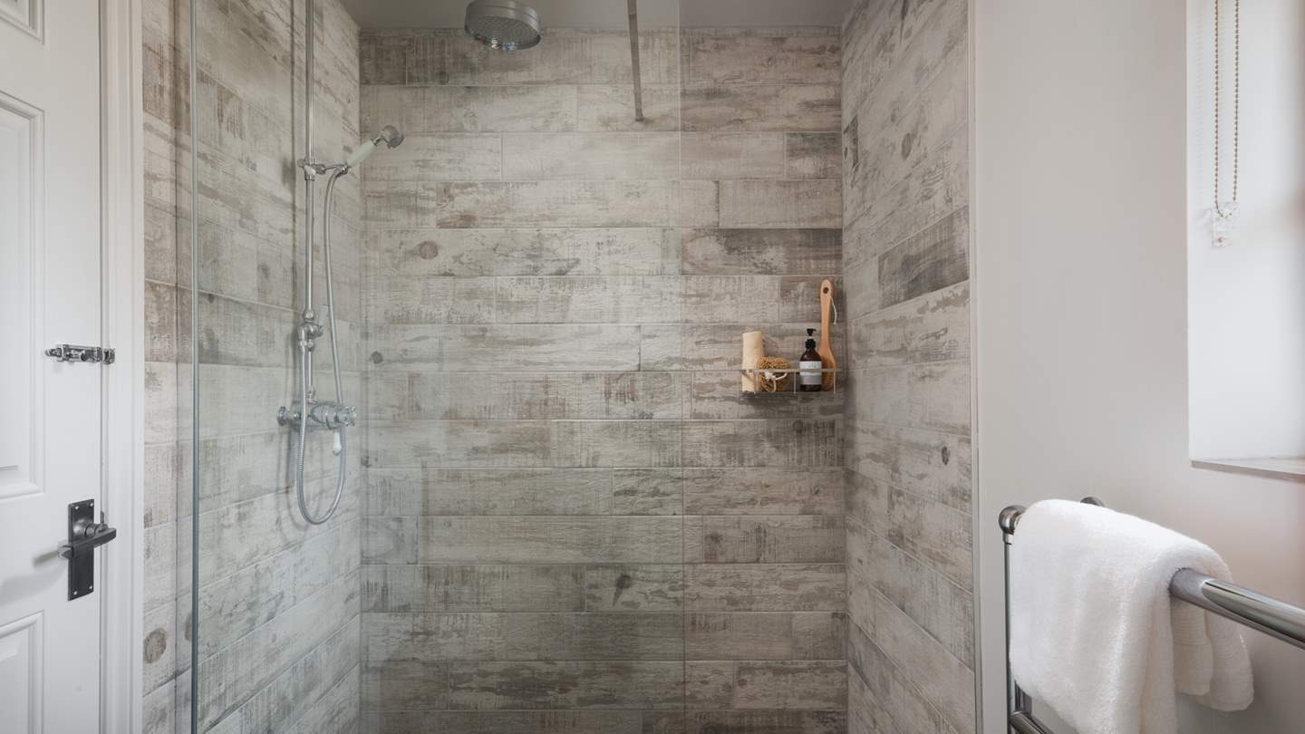 You'll find an en suite shower room through the adjoining door 