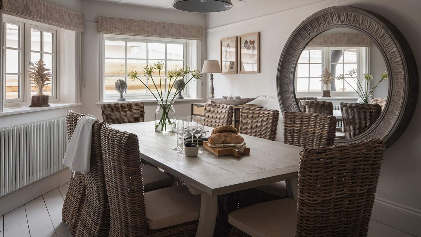 An additional, formal dining room with dual aspect windows can be found next door