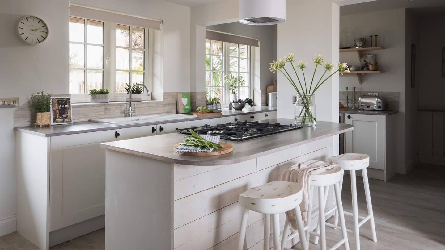 Step inside to uncover a timeless country interior style softened with a soothing palette of pale greys and creams