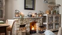 With delightful neutral interiors, a cosy wood burning stove and a heart-warming open fire