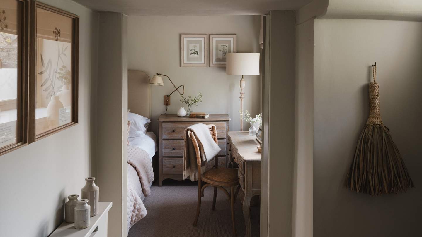 The master bedroom is a neutral dream, with an exquisite king-sized bed