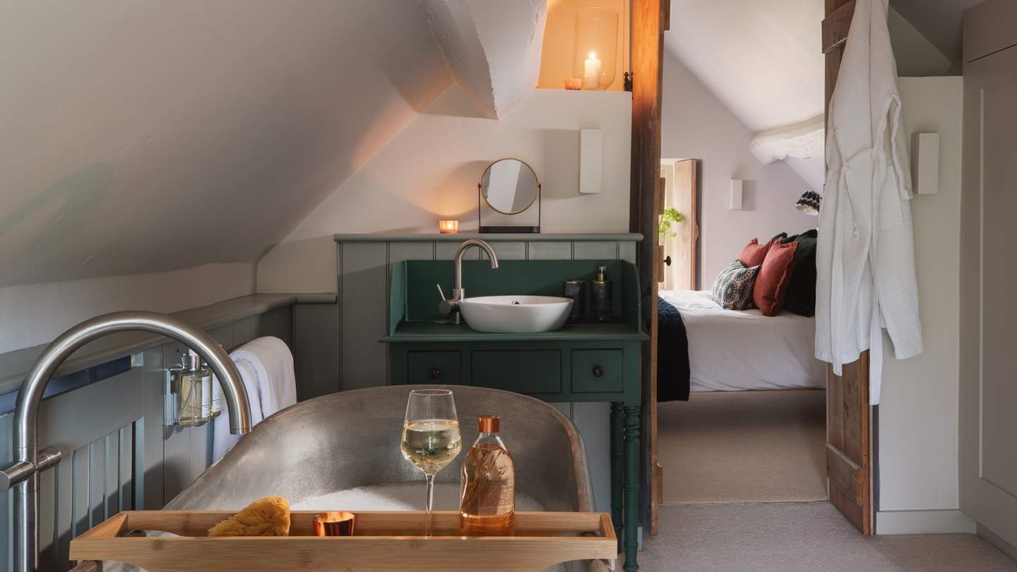 Slip softly into the beautiful, free-standing copper bathtub for bubble-topped moments...