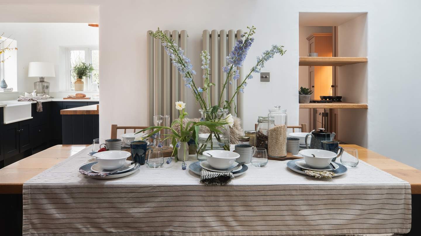 Take a seat at the kitchen’s breakfast island or gather around the family-sized dining table in the adjacent dining room and enjoy time together