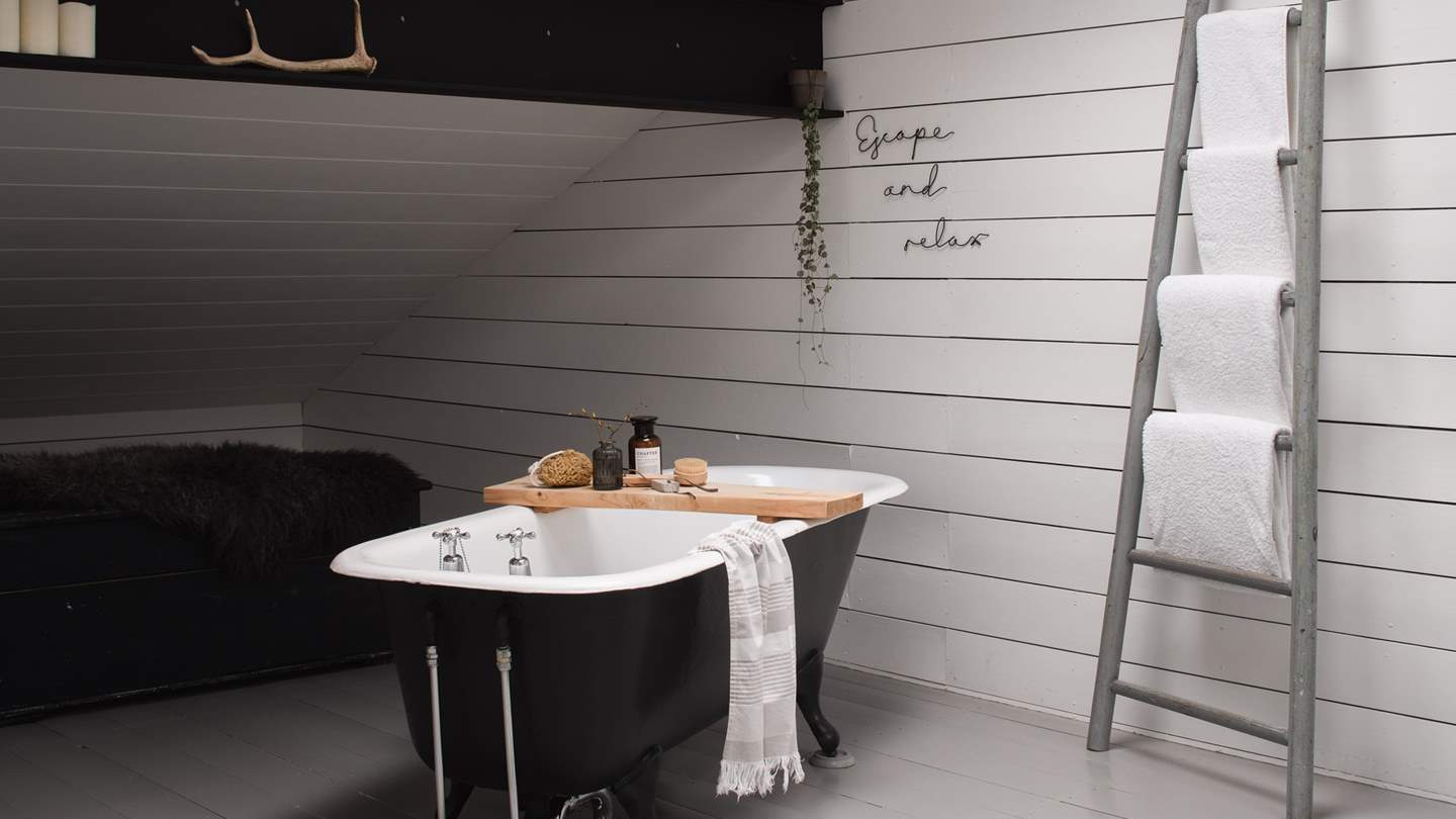 A rolltop bath awaits for soothing soaks after hours of adventure