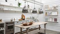 The deVOL kitchen features a Silestone worktop and vintage workbench island, creating plenty of space for rustling up feasts and gathering