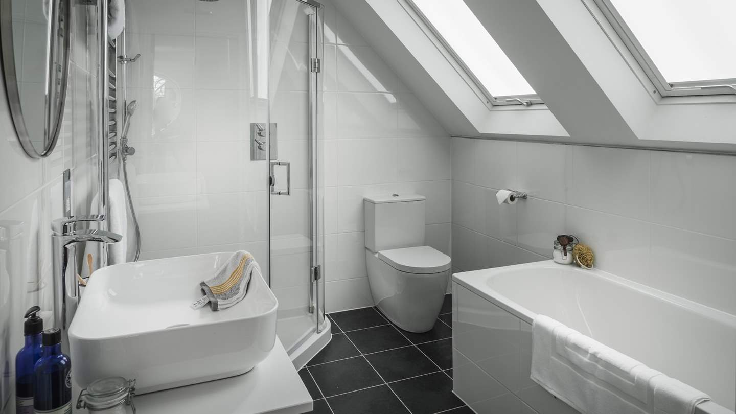 Like all of Arboretum's stunning bedrooms, this space has its own en suite bathroom, where a shower and bath await.