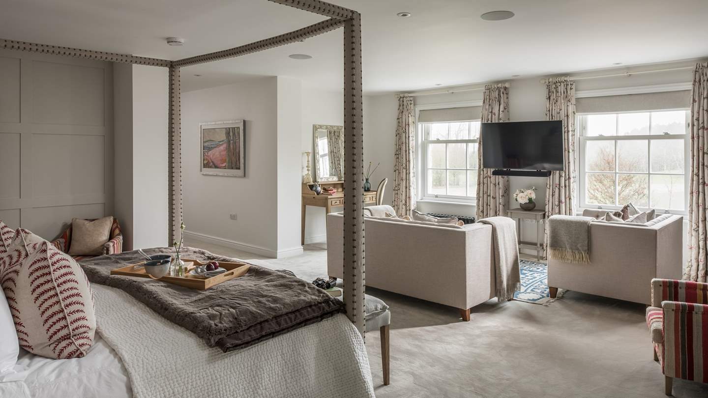 The master suite, bedroom one inspires sumptuous reverie with a symphony of cream and gold