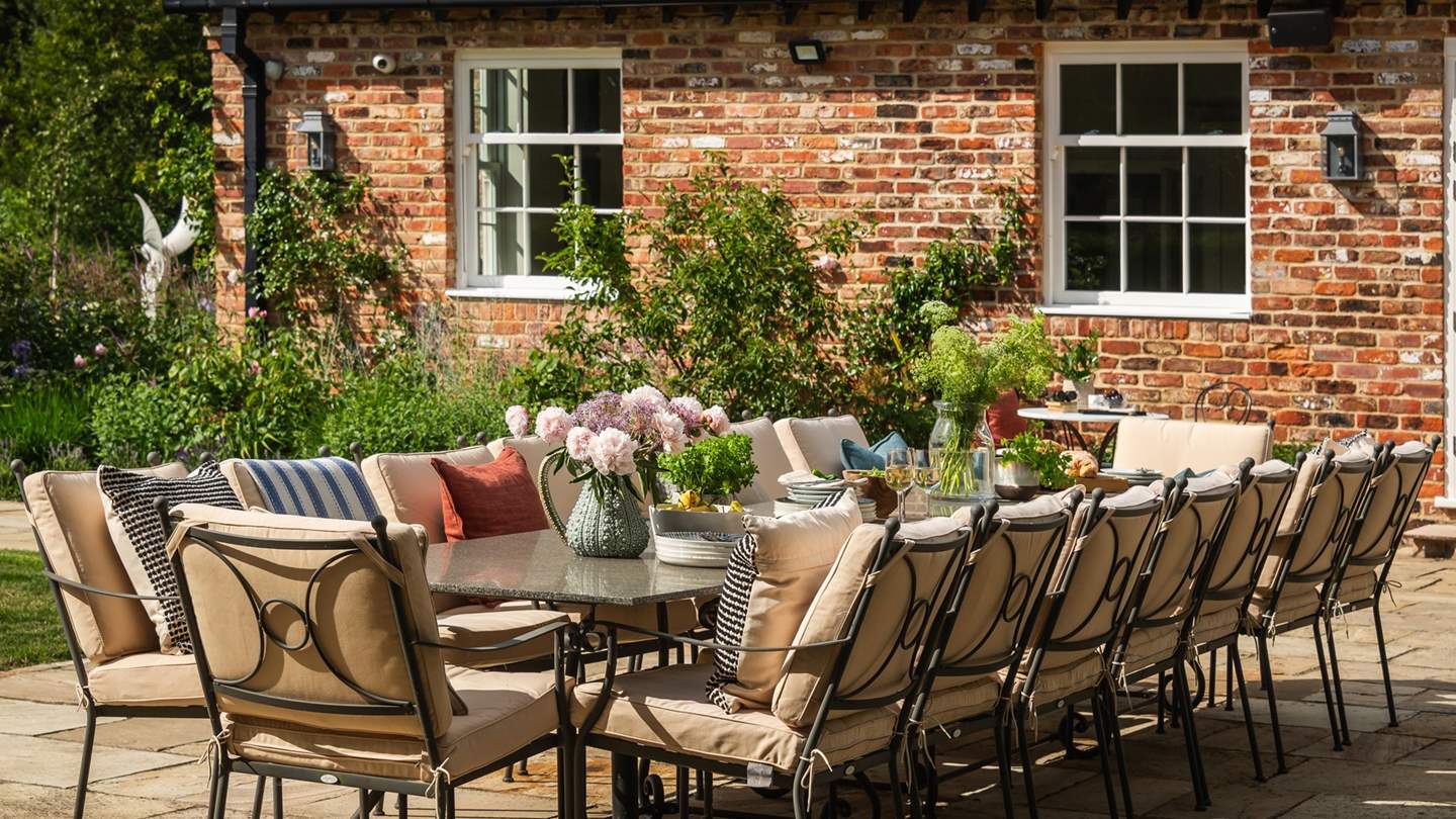 With a number of seating areas, you can find a 16-seater table and chairs on the patio outside the kitchen, tempting for alfresco feasts grilled on the Big Green Egg BBQ and served under open skies