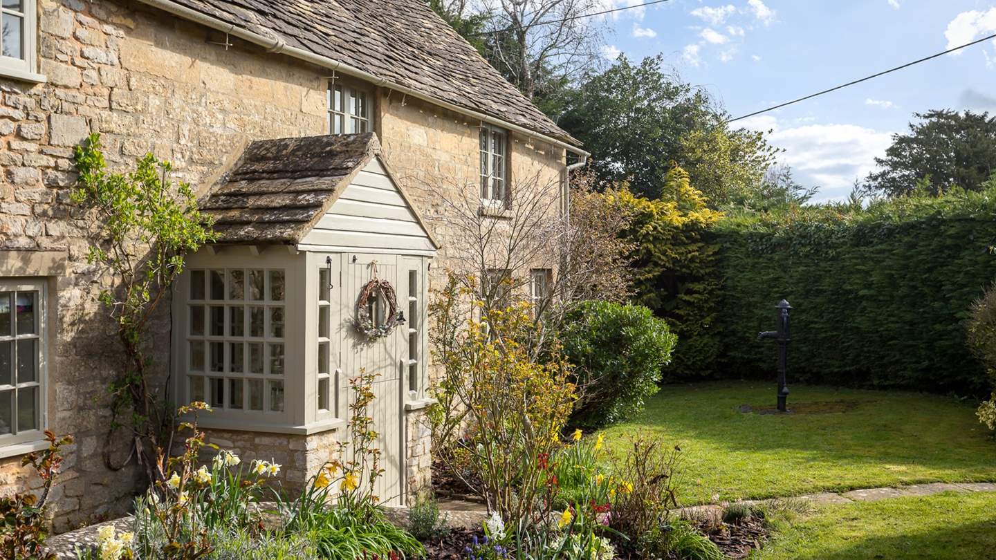 To the front of the retreat, with floral borders and shaded by trees is a lawn, offering a secluded picnic spot and roaming space for the little ones...