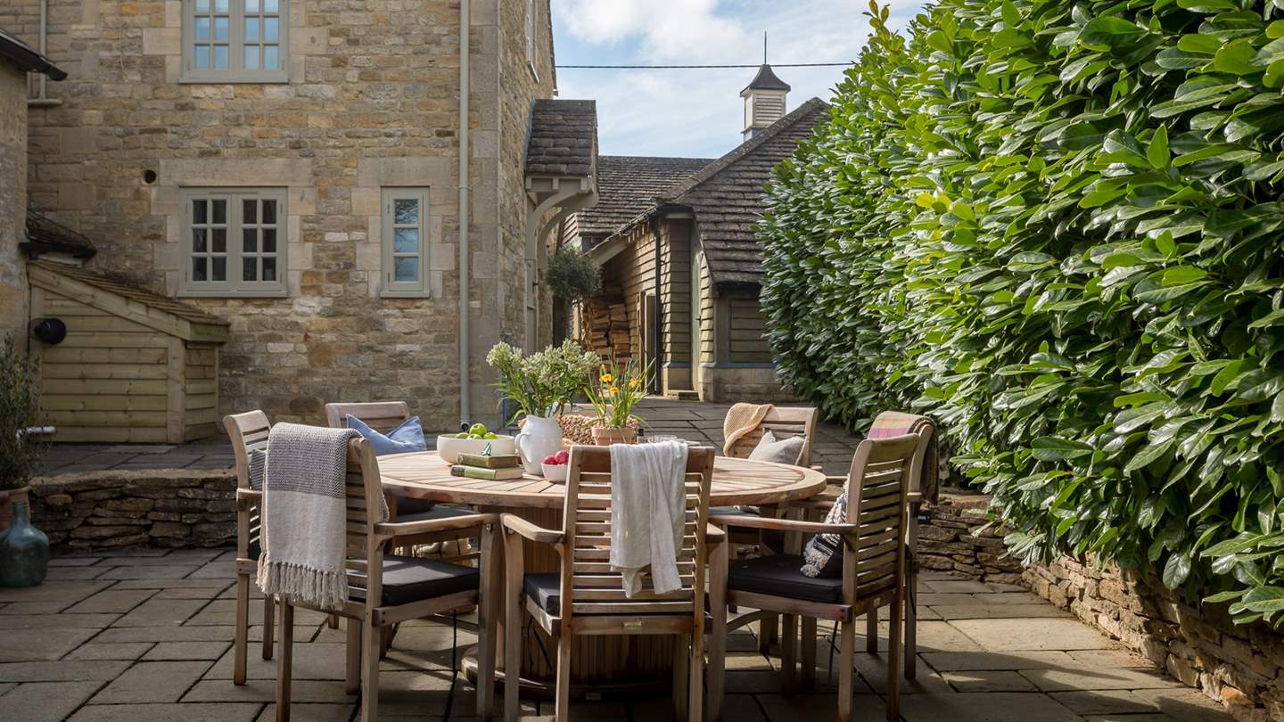 Gather for alfresco dining in Honeysuckle's abundant outdoor living spaces...