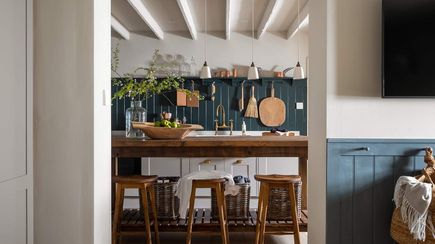 Through the double archway, modern luxury meets country living dreams in the stunning kitchen space