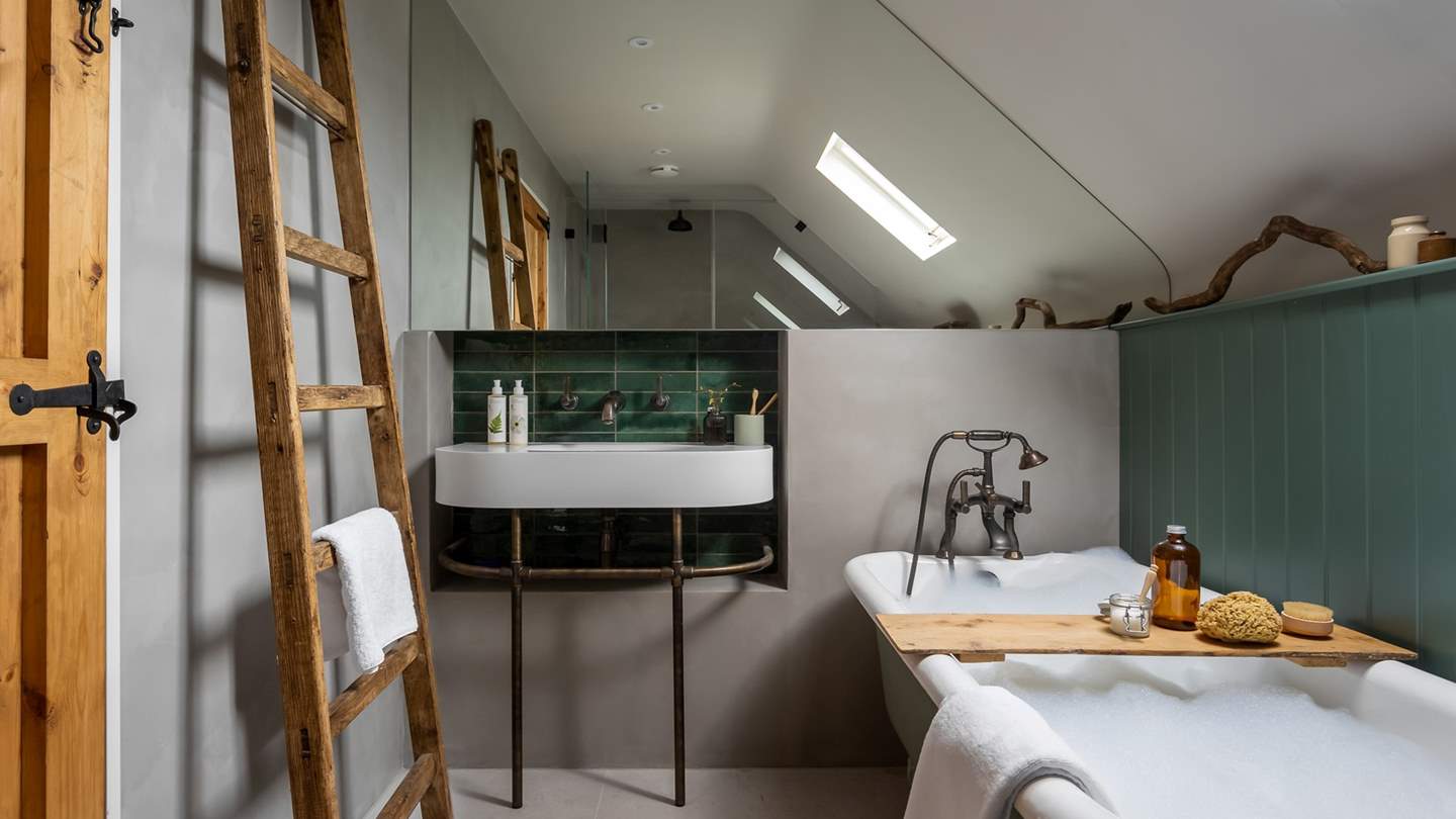 We just adore the glossy green tiling...