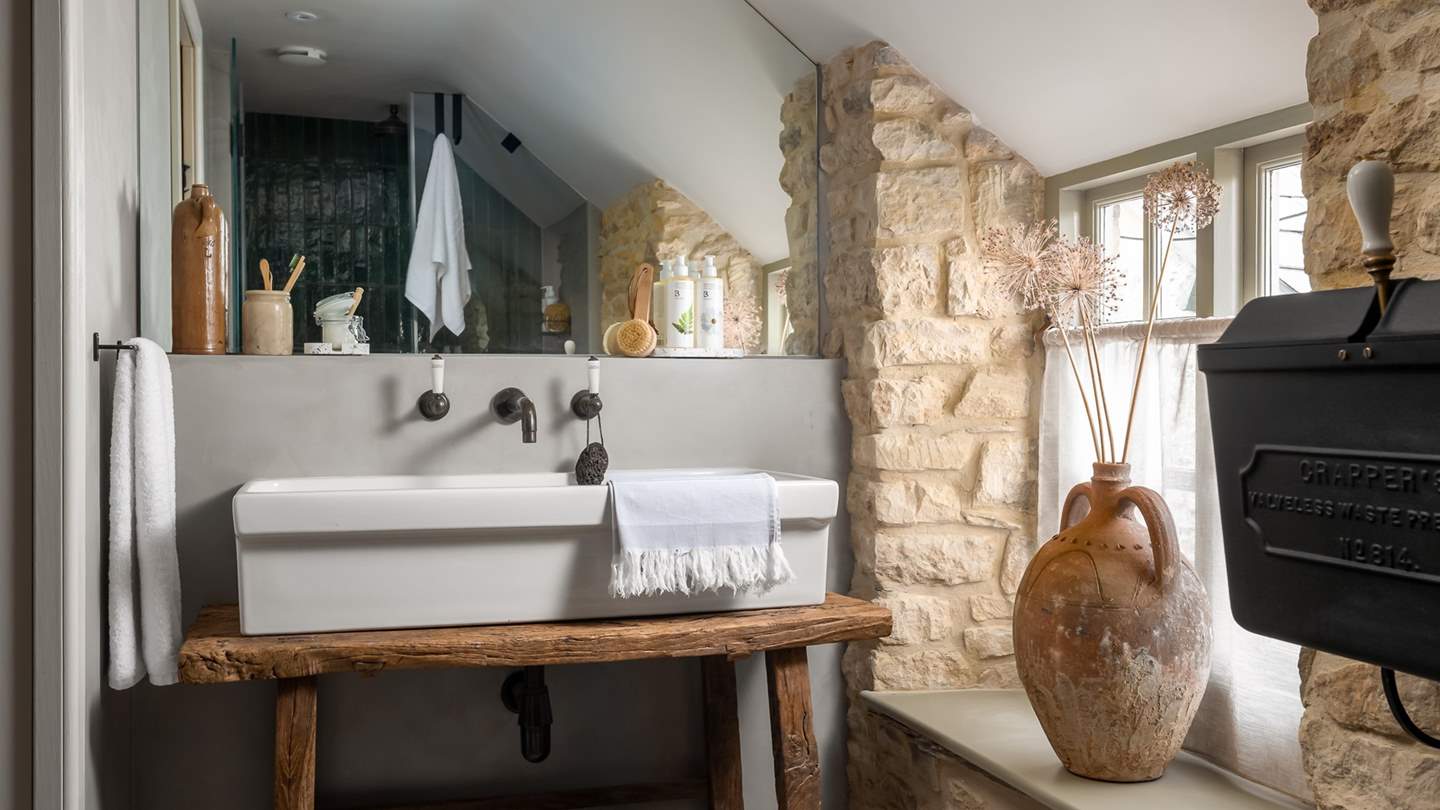 Rejuvenating self-care moments await in the spacious shower room