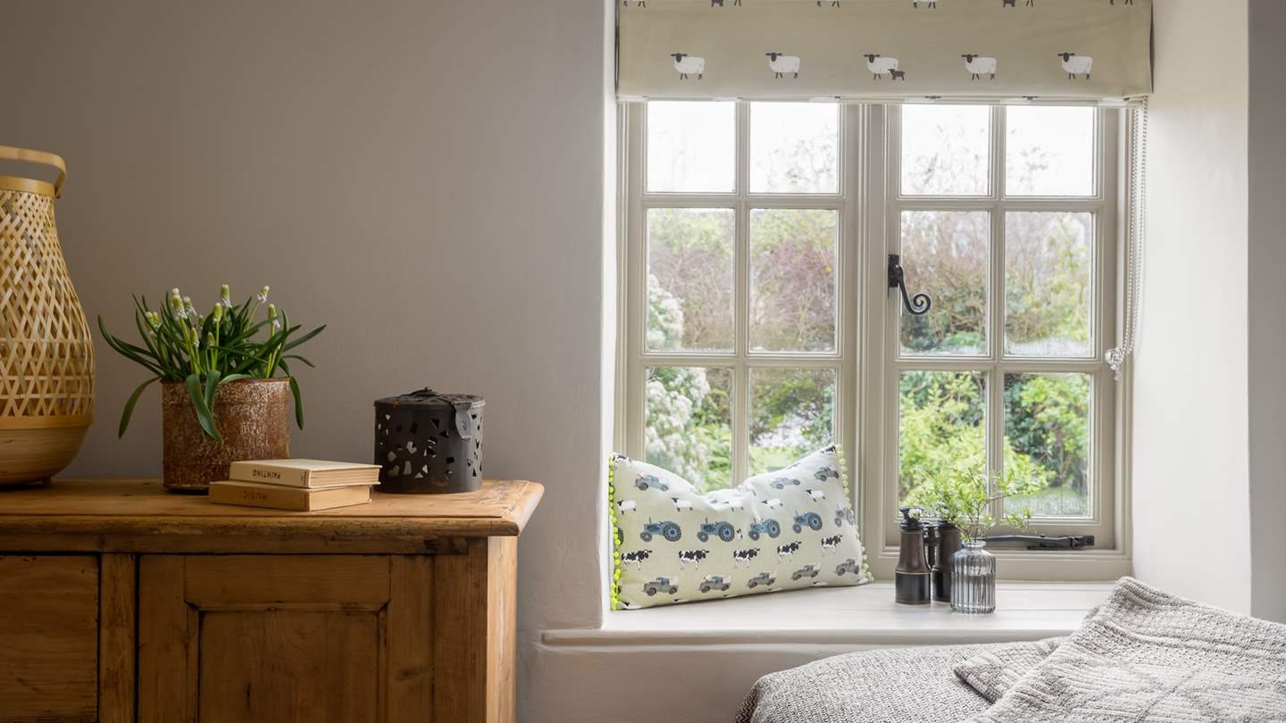 Perch in the window seat and gaze onto sweet country scenes