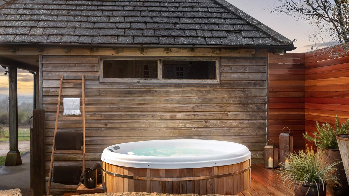 Settle in the balmy cedar hot tub with a glass in hand at dusk... 